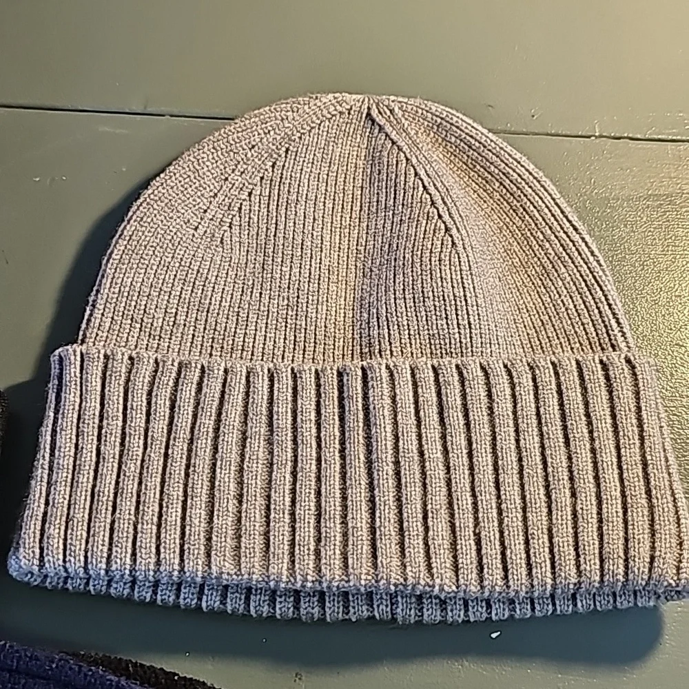 3 winter hats. Gray‎ beanie,  new. Red beanie used, ear muff reversible.